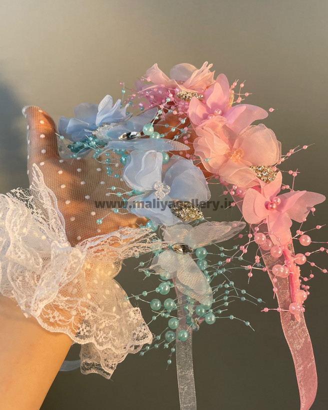 تلتاج گل و پروانه